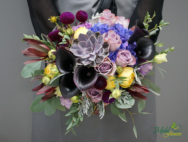 Bridal bouquet with black calla lilies, yellow peony-style roses, blue hydrangea, purple roses, and succulents photo
